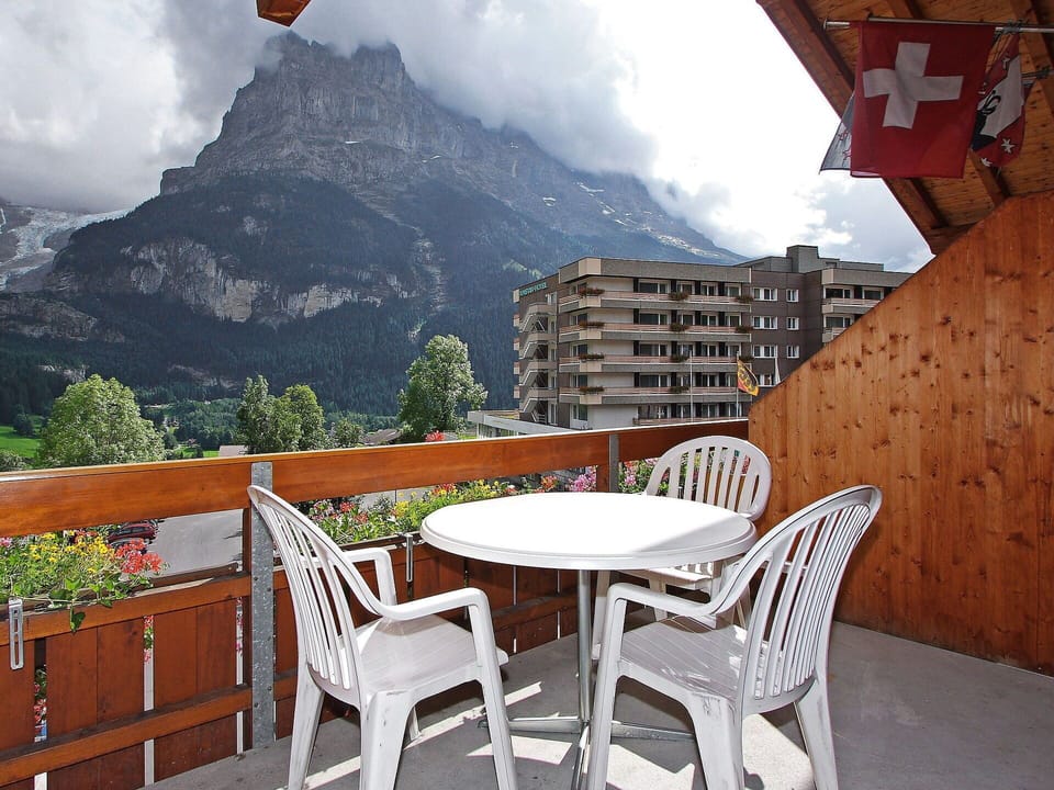 Cloud, Sky, Table, Furniture, Property, Building, Mountain, White, Chair, Green
