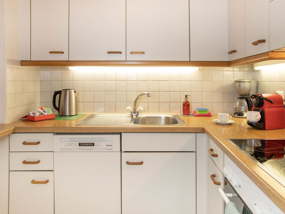 Kitchen, Countertop, Kitchen Appliance, Cabinetry, Major Appliance, Kitchen Sink, Wood, Interior Design, Plumbing Fixture, Sink