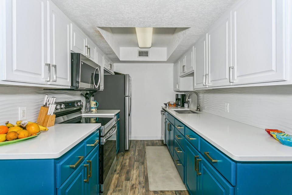 Fully updated kitchen with quartz countertops and new backsplash
