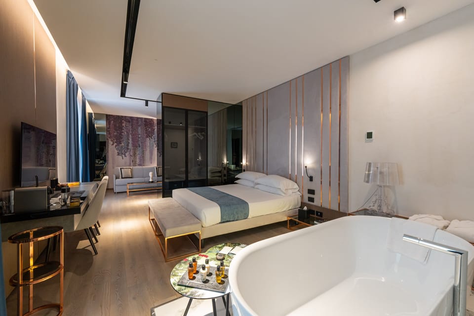 Suite, Bathtub | Premium bedding, minibar, in-room safe, desk
