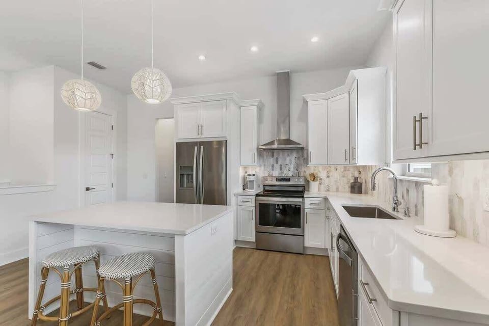 Kitchen includes Keurig and stainless steel appliances