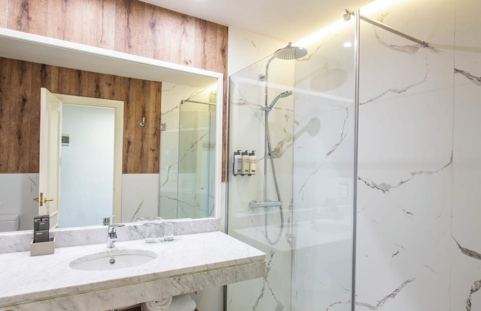 Eco-friendly toiletries, hair dryer, towels, soap