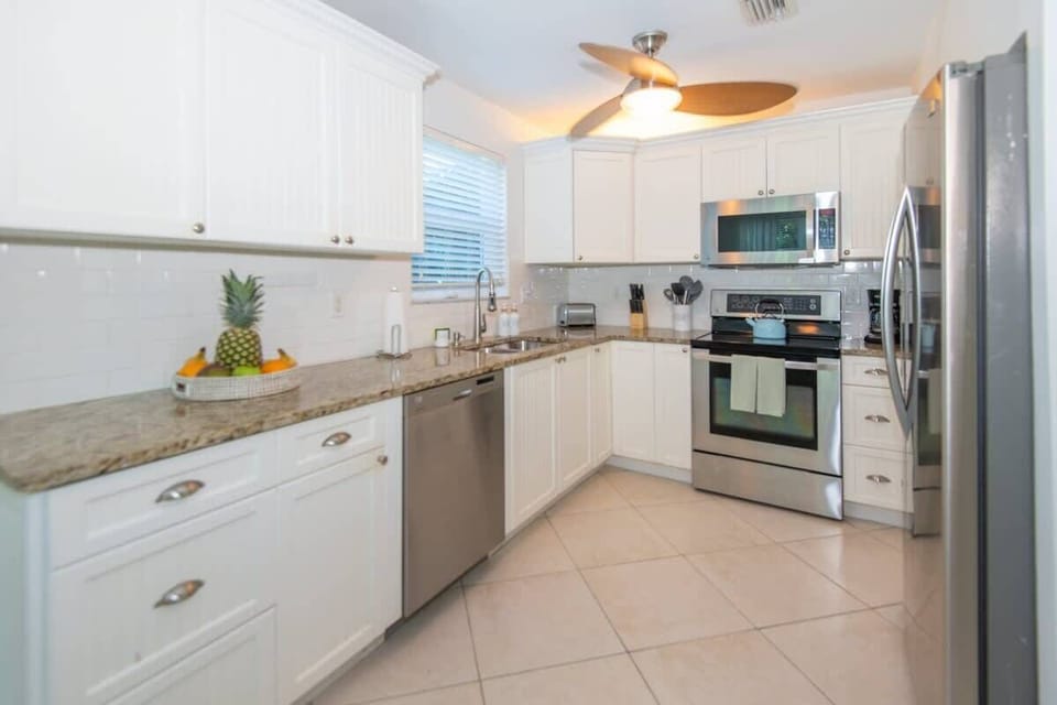 Prepare your favorite meals in this open concept kitchen with all stainless steel appliances.