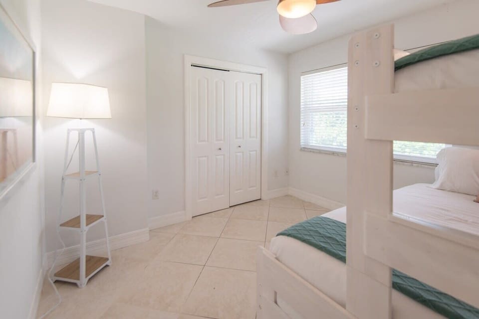 Plenty of space for the entire family. Our second bedroom features another ensuite bathroom and 3 beds. 