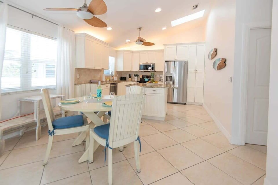 Step into the heart of the home with this cozy kitchen setup! Gather around the table, pull up a chair, and enjoy the fully equipped kitchen. #KitchenVibes #HomeIsWhereTheHeartIs #FoodieParadise
