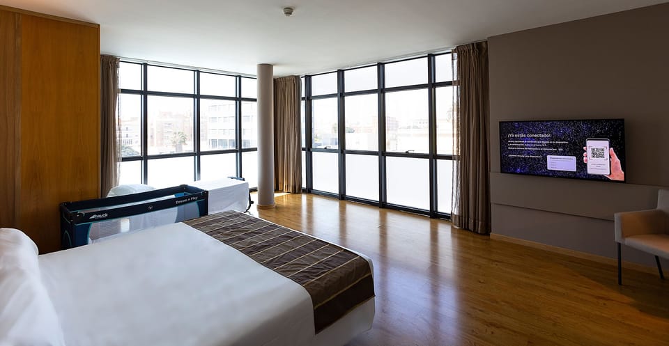 Family Quadruple Room | Minibar, in-room safe, desk, soundproofing