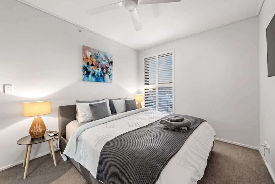 Master King bedroom with overhead fan, walk-thru wardrobe + private ensuite