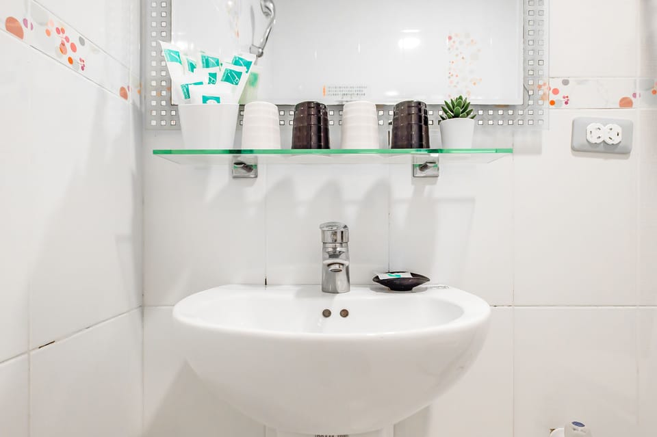 Quadruple Room, Balcony | Bathroom | Shower, hair dryer, towels, shampoo