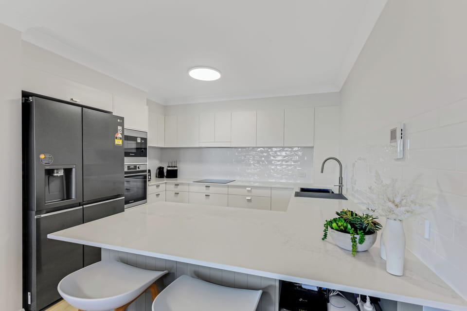 Family Apartment | Private kitchen | Full-size fridge, microwave, oven, stovetop
