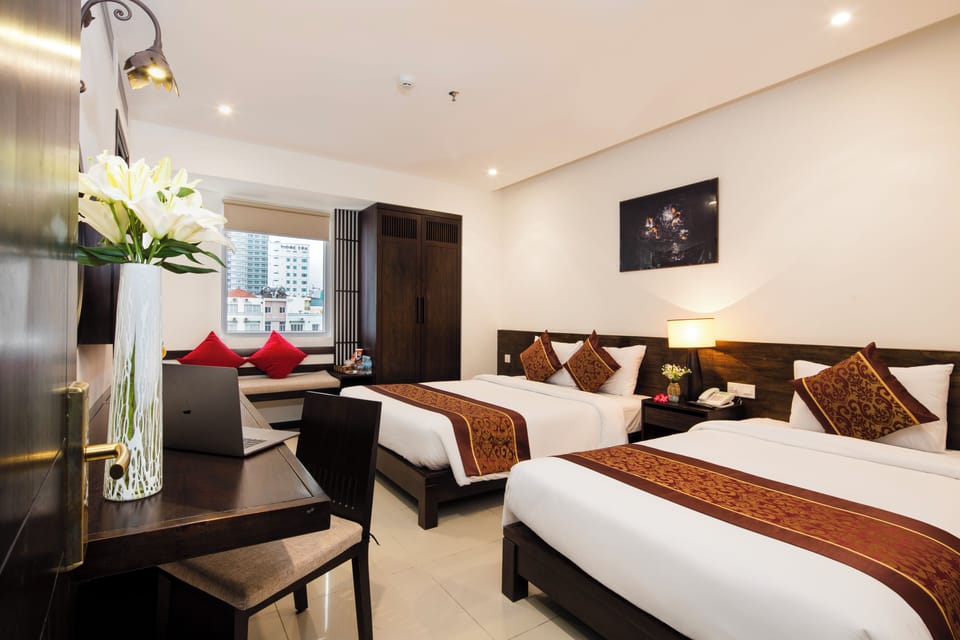 Deluxe Triple Room | Premium bedding, minibar, in-room safe, desk