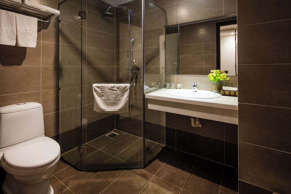 Superior Triple Room | Bathroom | Combined shower/tub, rainfall showerhead, designer toiletries