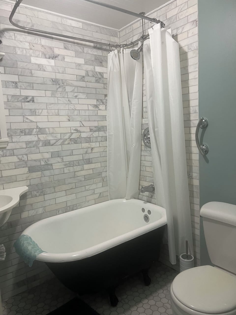 Small but elegant bathroom, vintage clawfoot tub, renovated 2017