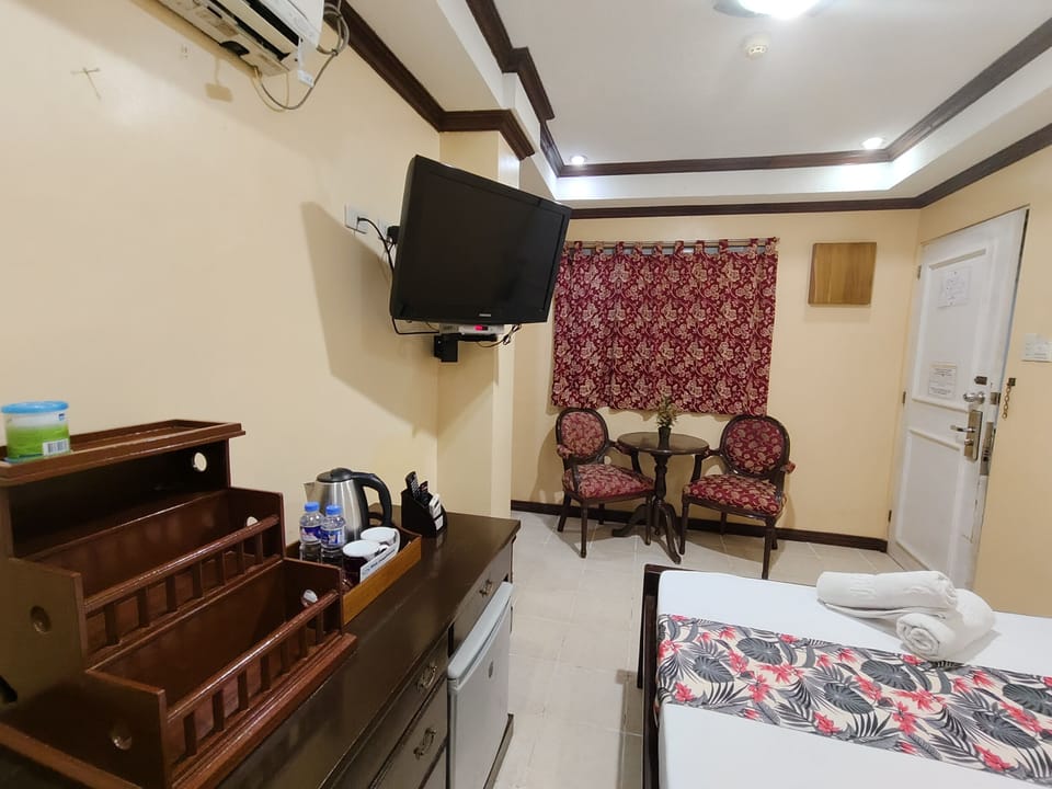 Standard Room, Garden Area | In-room safe, iron/ironing board (on request), WiFi (free), bed sheets