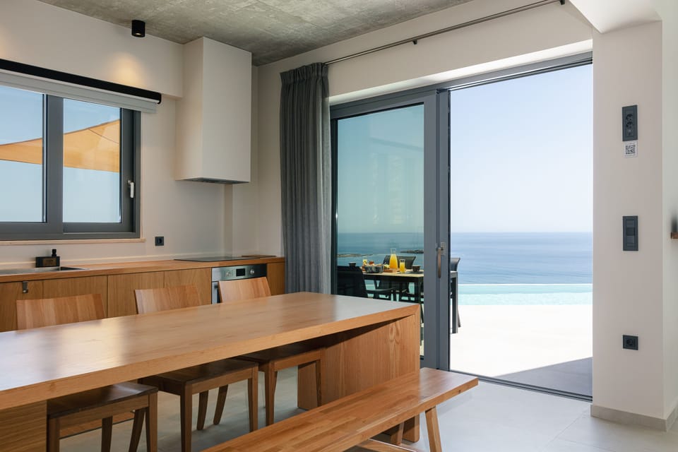 The dining table comfortably seats up to 6 guests.