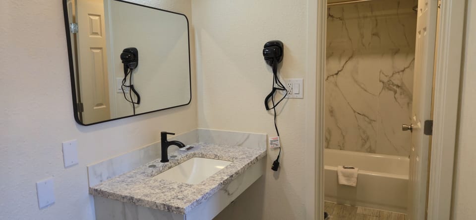 Standard Double Room, 2 Queen Beds | Bathroom | Free toiletries, hair dryer, towels, soap