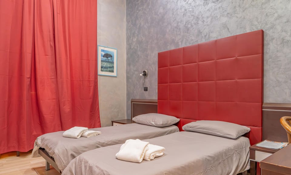 Double or Twin Room | Desk, blackout drapes, free WiFi, bed sheets