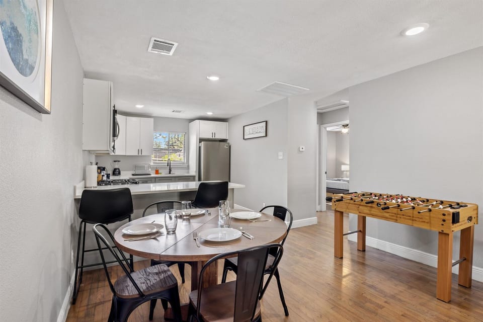 Charming dining table full of tableware and silverware included.