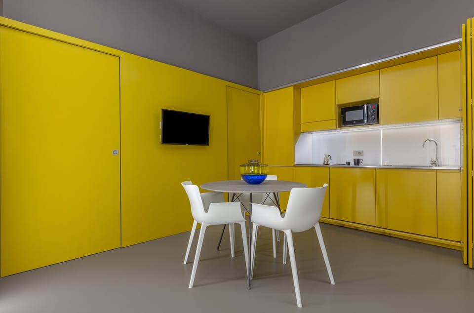Superior Suite | Private kitchen | Mini-fridge, espresso maker, highchair, cleaning supplies