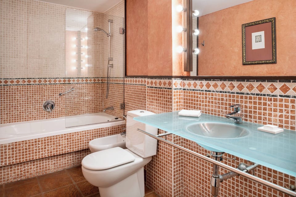 Free toiletries, hair dryer, bidet, towels