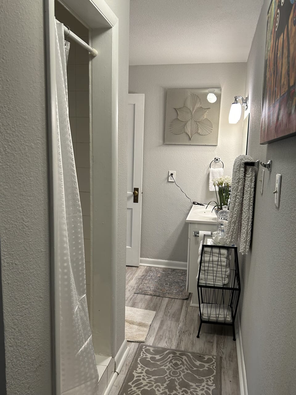 Second bathroom with walk-in shower (laundry room attached)