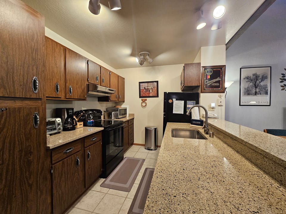 Condo, 2 Bedrooms | Private kitchen | Fridge, oven, coffee/tea maker, toaster