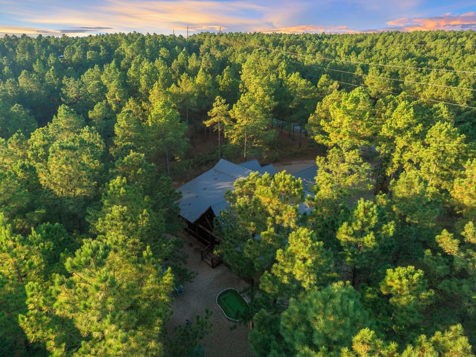 Book The Conifer Cabin for your next getaway to the Oachita forests in Broken Bow!