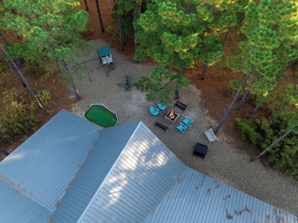 Tucked into the trees and wrapped in quiet—this peaceful setting is made for reconnecting with nature and each other.