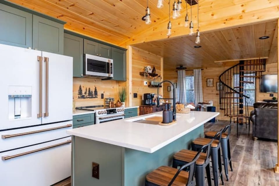 Gourmet kitchen with GE Cafe appliances, rare for a vacation rental to have!