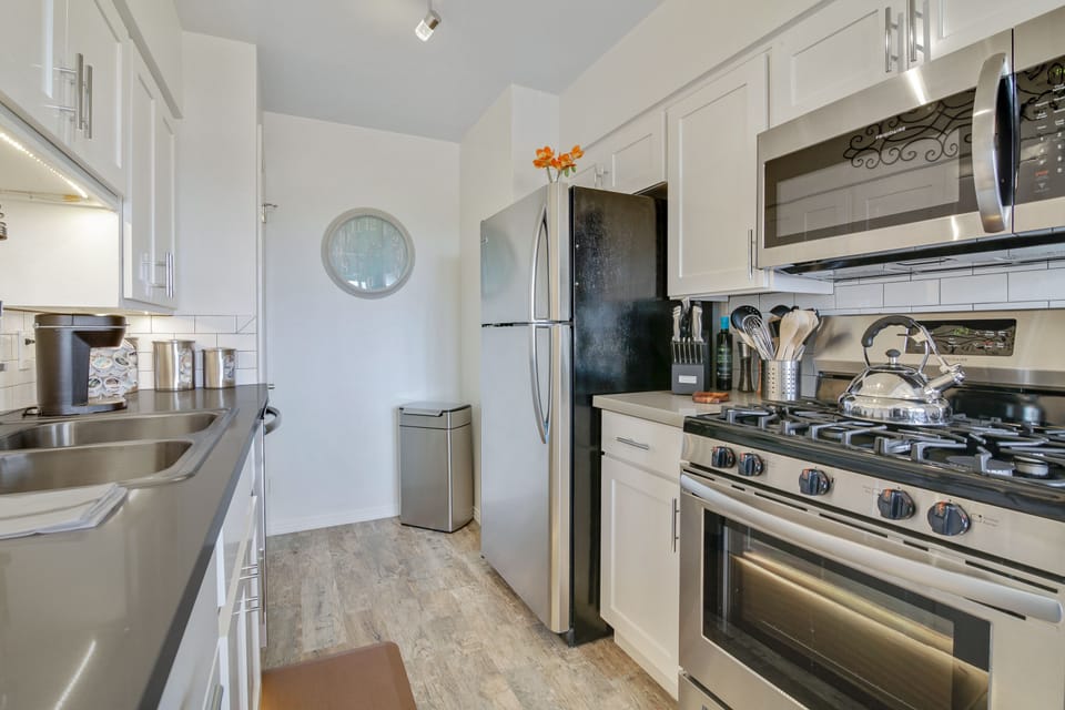 Stylish design and top-notch appliances define this stunning kitchen.