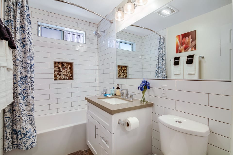 Tranquil and modern, this bathroom offers a relaxing oasis with a light colors. 