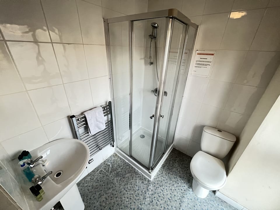 Shower, free toiletries, towels, soap