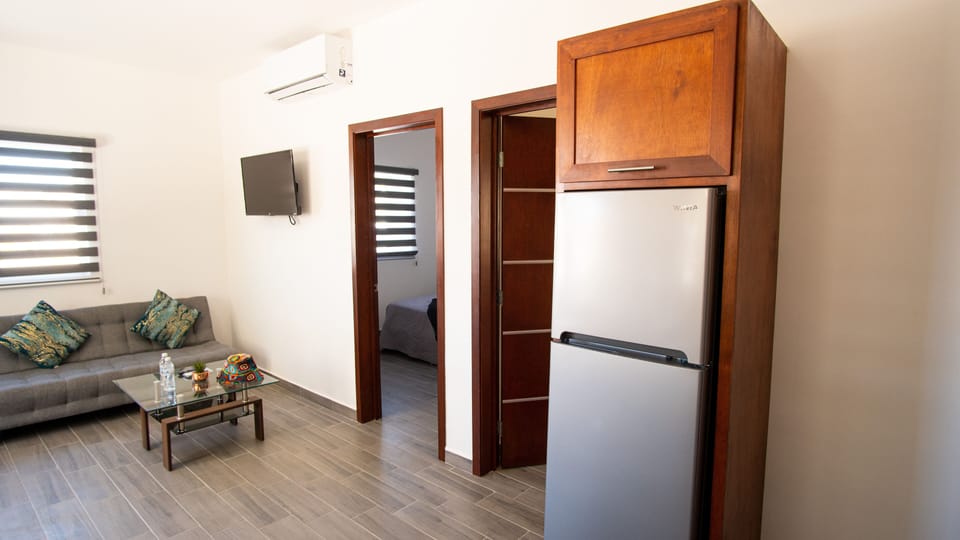 Comfort Condo | Living area | 42-inch LED TV with digital channels, TV