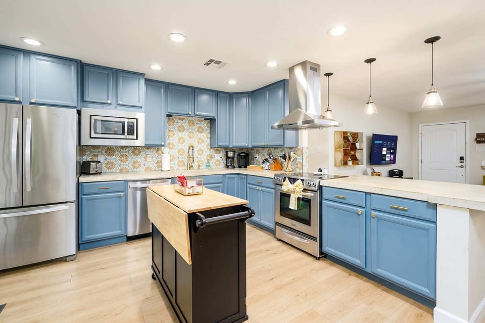 The Chef's kitchen is equipped with all cooking essentials for any meal.