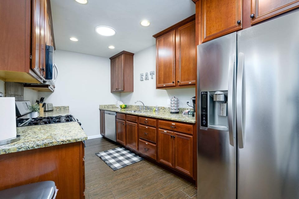 Our fully equipped kitchen has granite countertops, making them easy to clean.