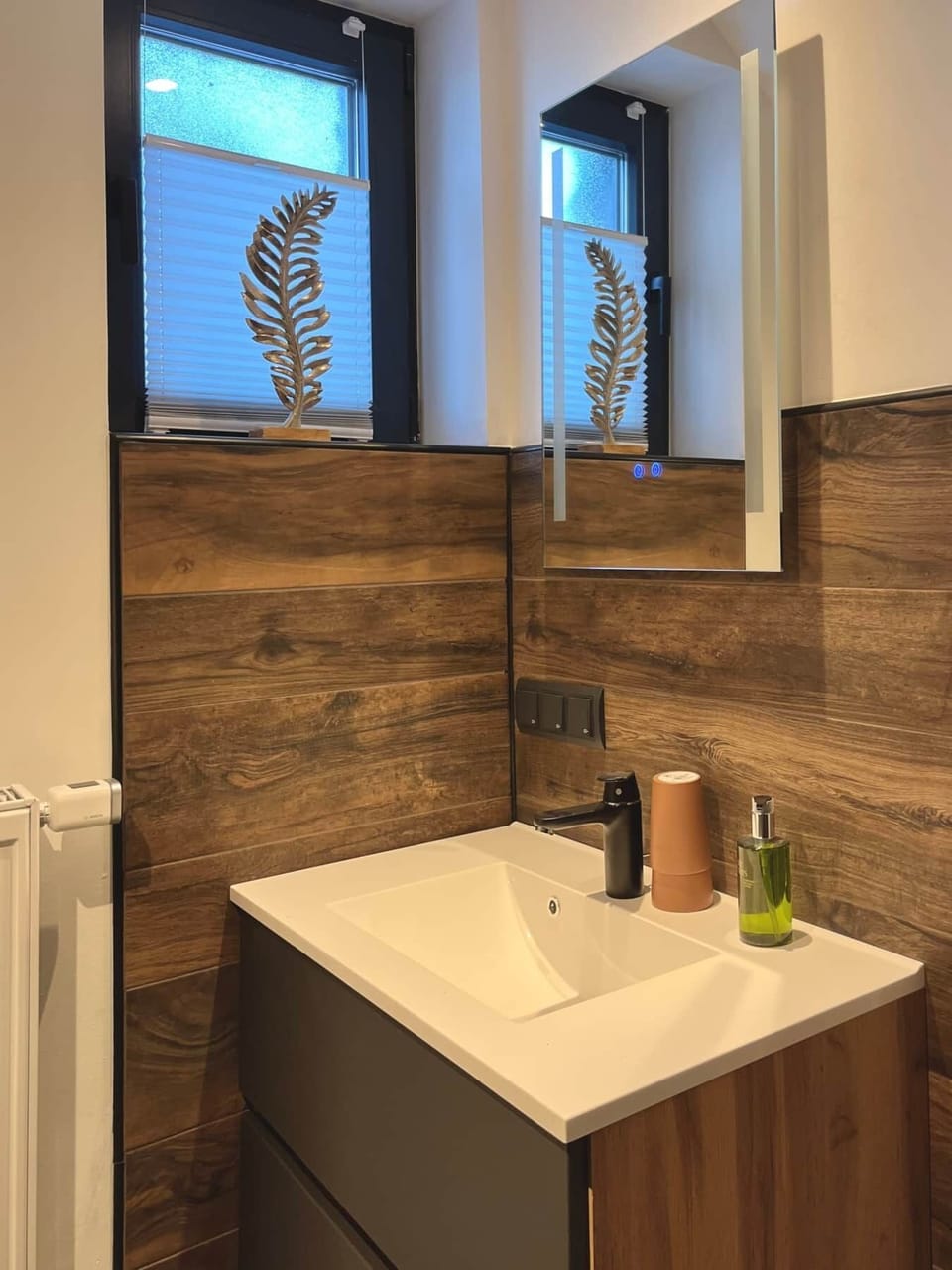 Bathroom with heated mirror
