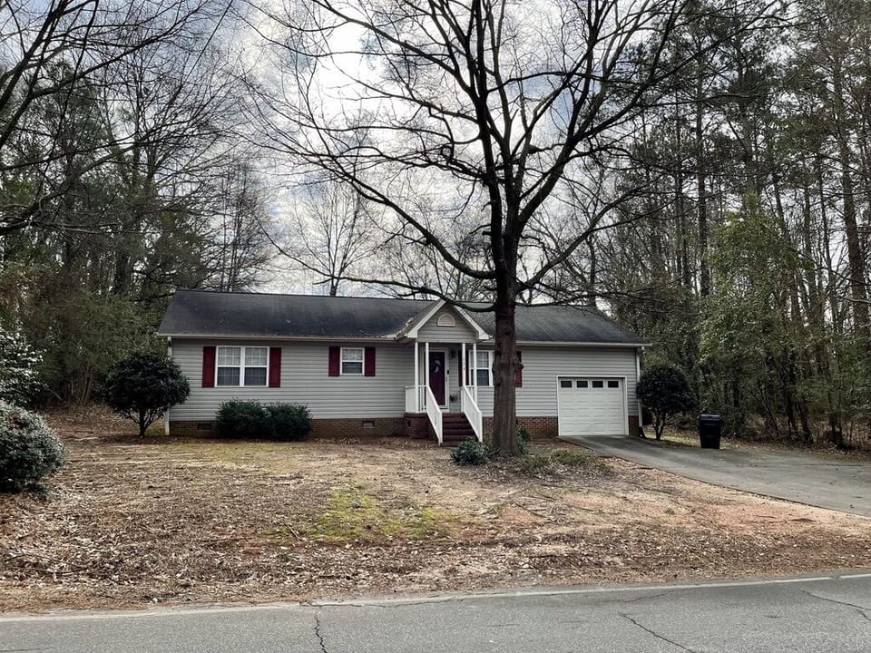 Front of the property, Road is not busy and connects to Clemson Blvd