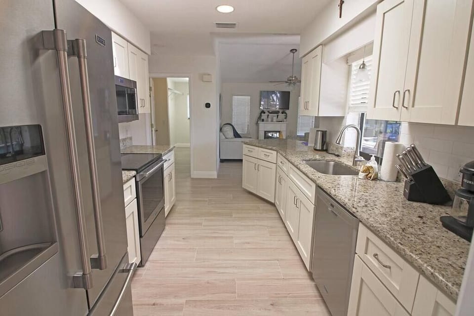 Huge kitchen with plenty of cookware