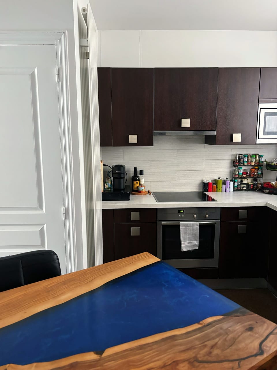 Breakfast / bar table and stools for supplemental seating.