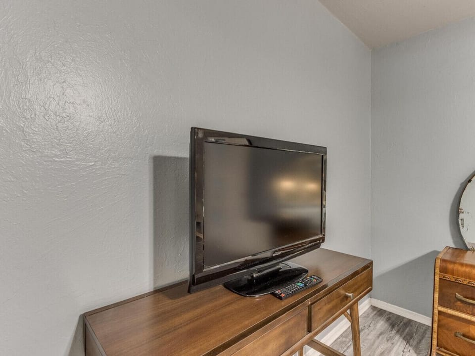 Unwind and indulge in your favorite shows on the sleek and modern TV