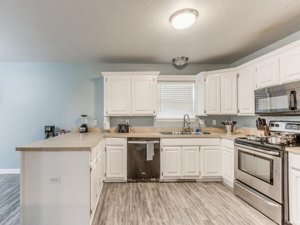 Unleash your inner foodie in this inviting and well-equipped kitchen.