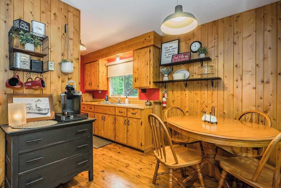 Step over to the kitchen and dining area, tucked away behind the living space.