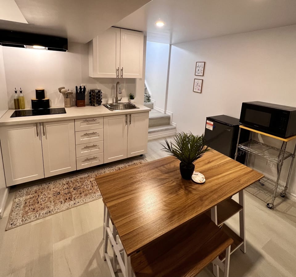 Kitchen and dining area. Mini fridge, microwave, cooktop, everything you need