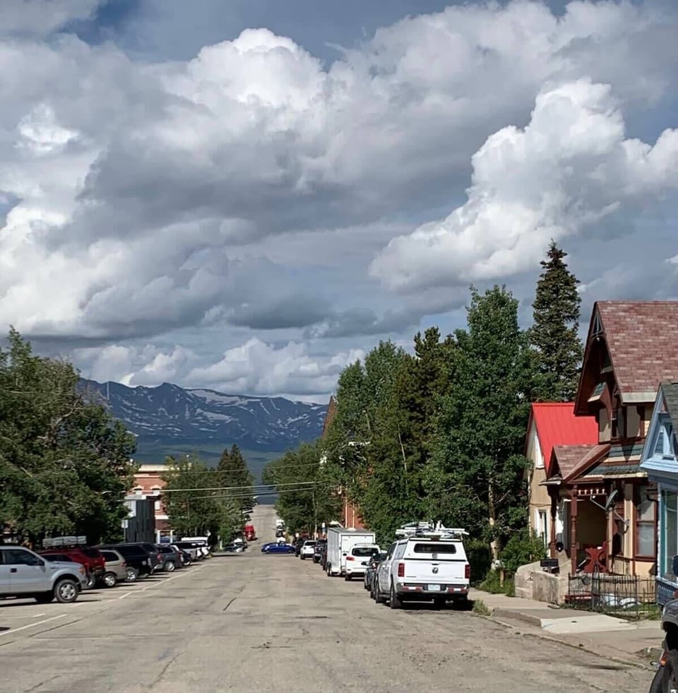 【Neighborhood】 Mt. Massive views straight down 8th Street — Colorado's second-highest peak from the front sidewalk.