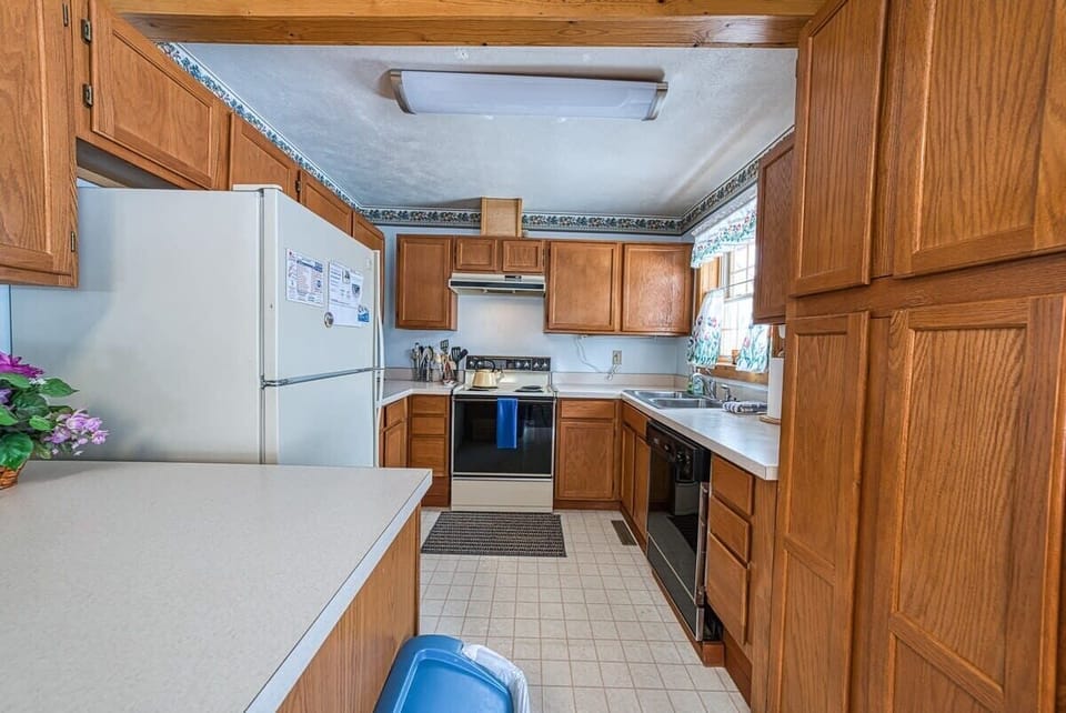 【Kitchen】Counter prep space plus coffee setup — stocked for real cooking