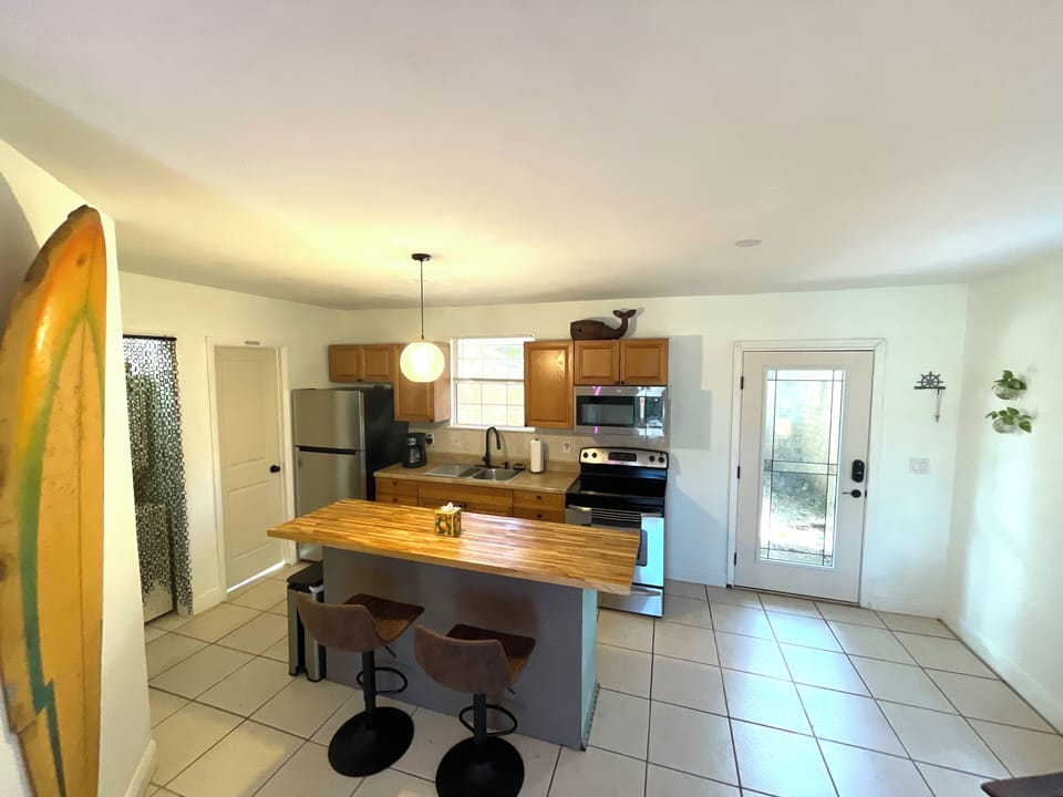 Fully stocked, well maintained kitchen and dining area.