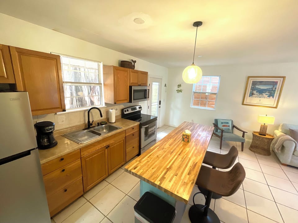 Fully stocked, well maintained kitchen and dining area.
