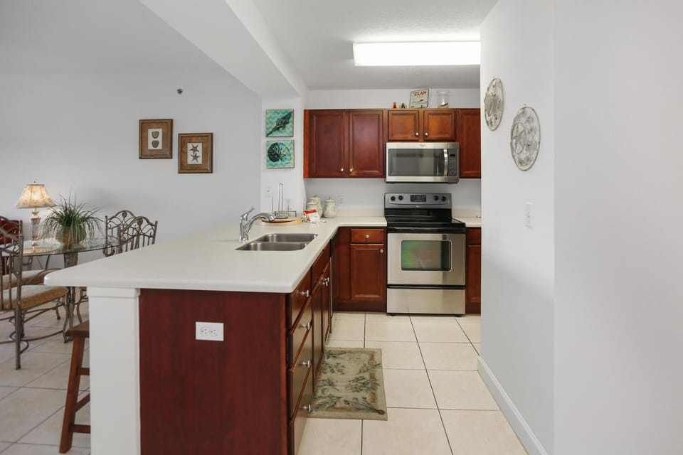 Condo, Multiple Beds (Waterside Village Condo 302) | Private kitchen | Oven, toaster