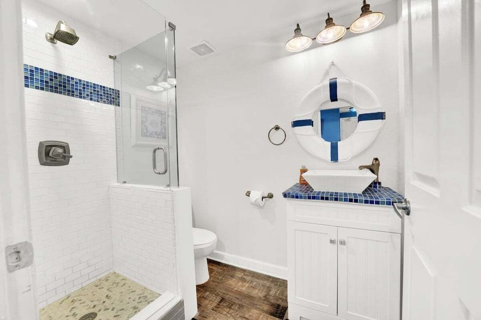 The bunk room includes its own private ensuite with a walk‑in shower, offering added convenience for guests.
