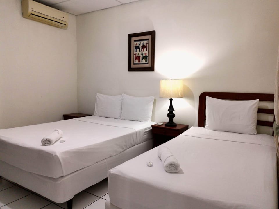 Premium bedding, blackout drapes, WiFi (free), individually decorated