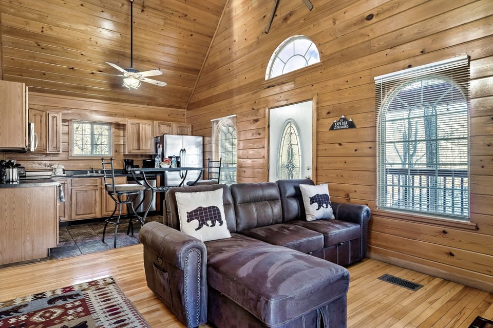 Living room and kitchen with lofted ceilings 
